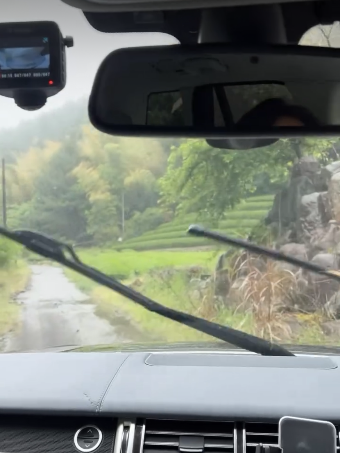 A rain-covered windscreen on the journey to Warashina.